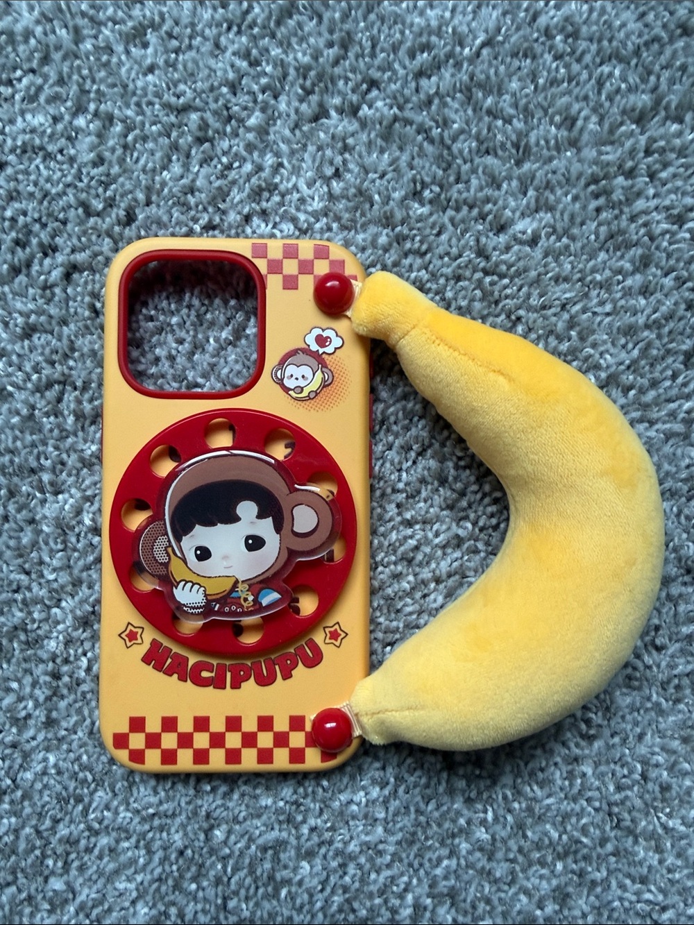 Popmart Hacipupu Yellow Plush Banana iPhone 16 Pro Phone Case with Monkey Design